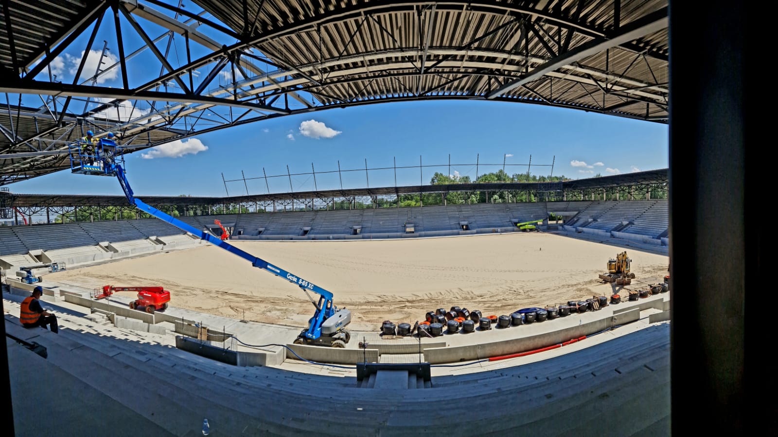 Monitoring roof and ground stability of a newly built stadium in a high-risk mining area